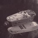 Baby in white coffin